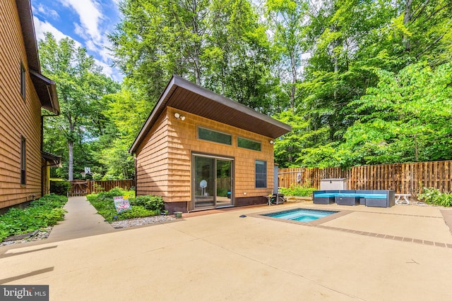 8323 Morningside Dr, Manassas, VA 20112 - view of swimming pool featuring an outdoor hot tub, a patio, a fenced backyard, and a swimming pool