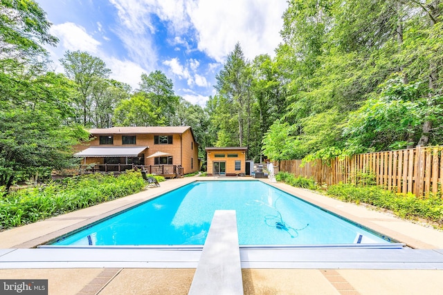 8323 Morningside Dr, Manassas, VA 20112 - view of pool with a diving board, an outbuilding, and a patio