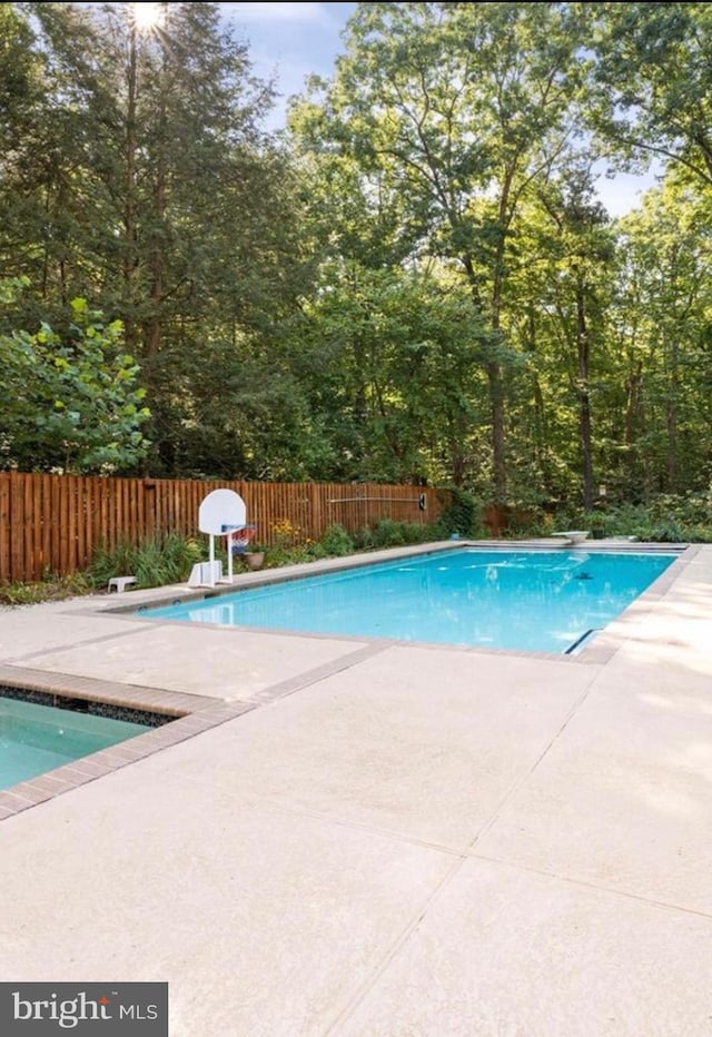 8323 Morningside Dr, Manassas, VA 20112 - view of pool featuring a patio, a fenced backyard, and a diving board