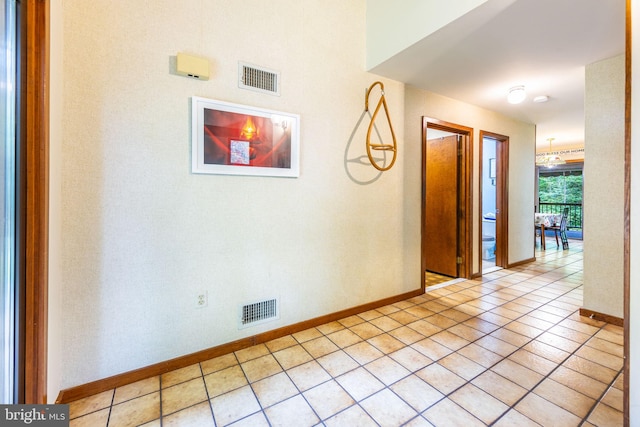 8323 Morningside Dr, Manassas, VA 20112 - corridor featuring baseboards and light tile patterned flooring