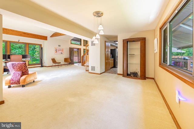 8323 Morningside Dr, Manassas, VA 20112 - sitting room with baseboards, light carpet, and stairway