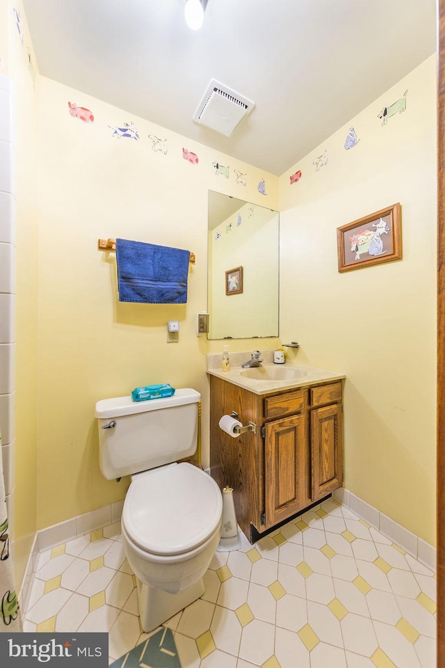 8323 Morningside Dr, Manassas, VA 20112 - bathroom featuring toilet, vanity, and baseboards