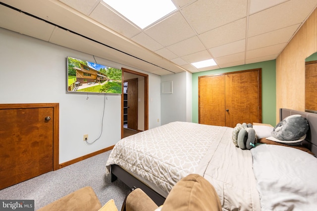 8323 Morningside Dr, Manassas, VA 20112 - carpeted bedroom featuring a closet, baseboards, and a paneled ceiling