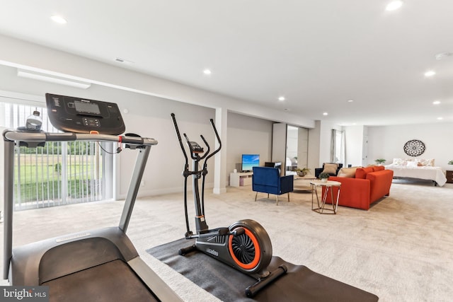 exercise room with carpet flooring and recessed lighting