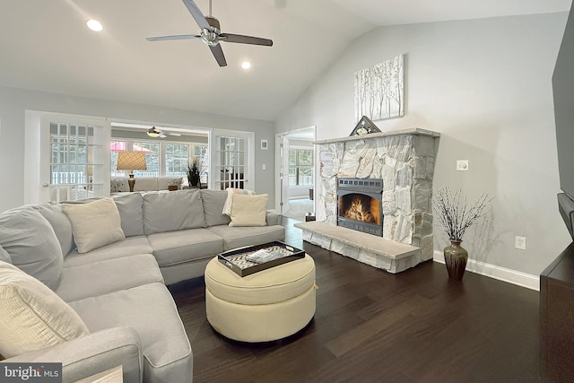 10 Greystone Dr, Lewes, DE 19958 - living room with a ceiling fan, wood finished floors, baseboards, a fireplace, and high vaulted ceiling