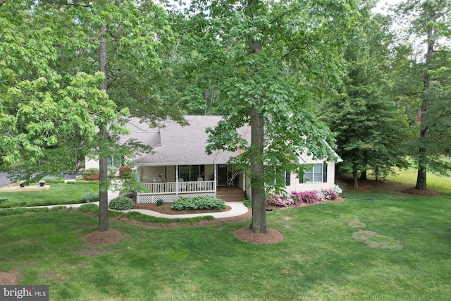 10 Greystone Dr, Lewes, DE 19958 - view of front of house featuring a porch, a front lawn, and roof with shingles