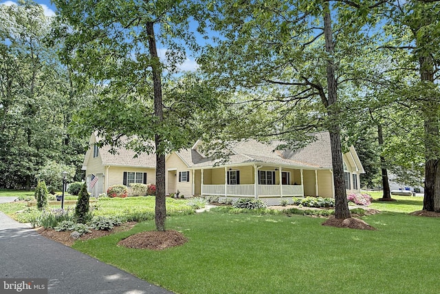 10 Greystone Dr, Lewes, DE 19958 - view of front of property featuring a porch, a front lawn, and a shingled roof