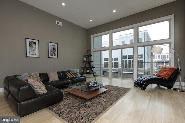 315 Dupont St, Philadelphia, PA 19128 - living area with a towering ceiling, wood finished floors, and recessed lighting