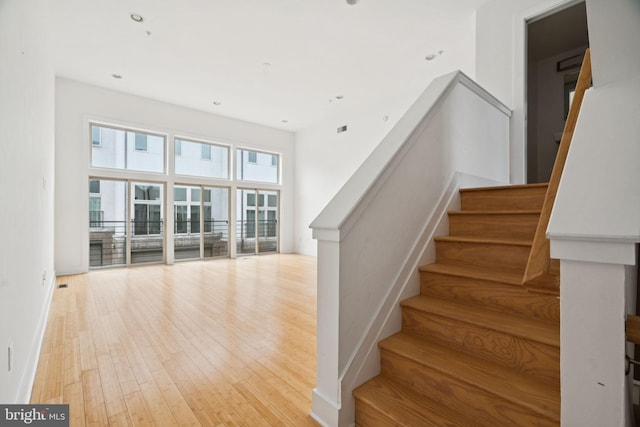 315 Dupont St, Philadelphia, PA 19128 - stairway featuring wood finished floors and recessed lighting