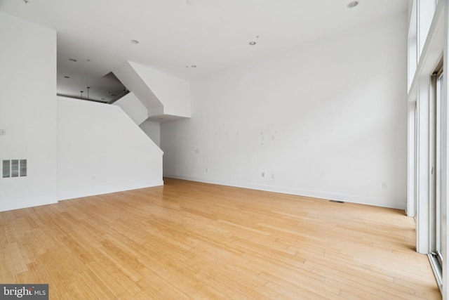 315 Dupont St, Philadelphia, PA 19128 - unfurnished living room with light wood-style floors and stairs
