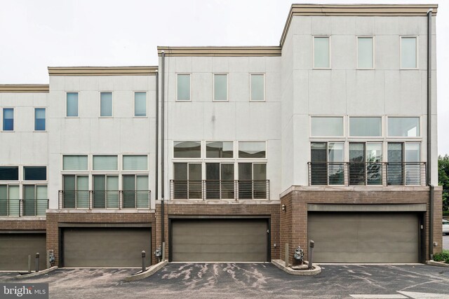315 Dupont St, Philadelphia, PA 19128 - view of property featuring an attached garage and driveway