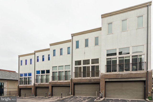 315 Dupont St, Philadelphia, PA 19128 - view of building exterior featuring a garage