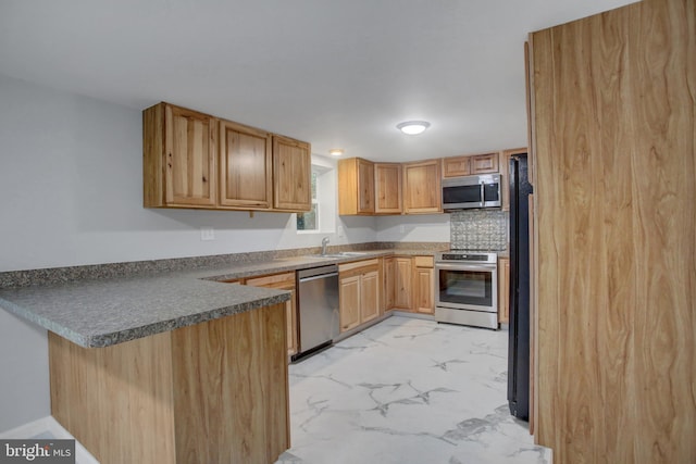 7 Cross Trl, Fairfield, PA 17320 - kitchen featuring stainless steel appliances, dark countertops, a peninsula, and light marble finish floors