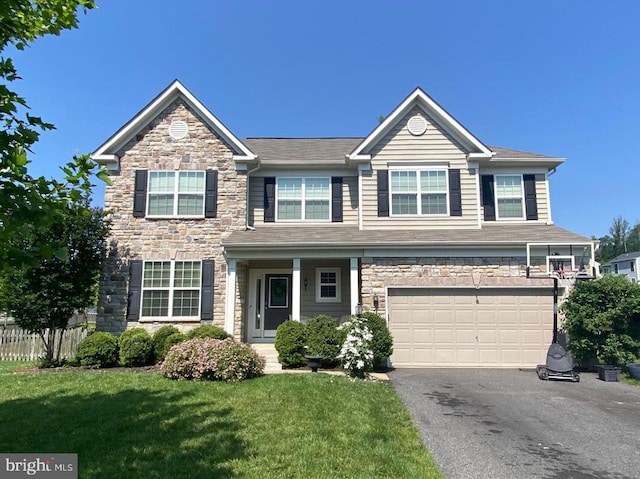 1 Crovo Ln, Fredericksburg, VA 22405 - view of front of home with stone siding, an attached garage, and driveway