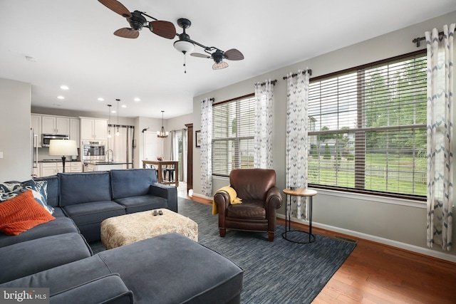 1 Crovo Ln, Fredericksburg, VA 22405 - living area featuring a ceiling fan, baseboards, wood finished floors, recessed lighting, and a chandelier