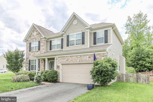 1 Crovo Ln, Fredericksburg, VA 22405 - view of front of house featuring stone siding, an attached garage, and driveway
