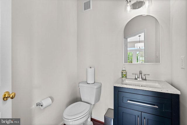 11221 Chaucers Ridge Ct, Laurel, MD 20723 - half bath with toilet, vanity, and baseboards