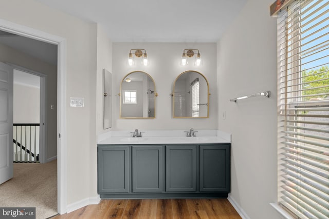 11221 Chaucers Ridge Ct, Laurel, MD 20723 - full bathroom with double vanity, healthy amount of natural light, and wood finished floors