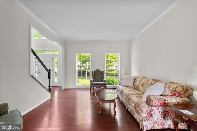 11221 Chaucers Ridge Ct, Laurel, MD 20723 - living area with wood finished floors, ornamental molding, plenty of natural light, stairs, and baseboards