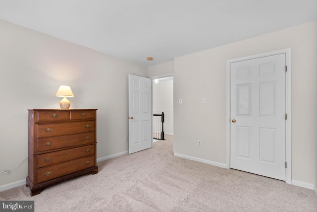 11221 Chaucers Ridge Ct, Laurel, MD 20723 - bedroom featuring light colored carpet and baseboards