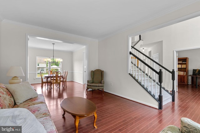 11221 Chaucers Ridge Ct, Laurel, MD 20723 - living area with a chandelier, ornamental molding, wood finished floors, stairs, and baseboards