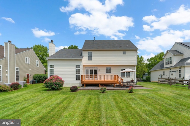 11221 Chaucers Ridge Ct, Laurel, MD 20723 - back of property with a patio, a lawn, a wooden deck, and central air condition unit