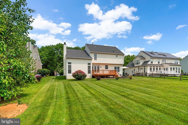 11221 Chaucers Ridge Ct, Laurel, MD 20723 - rear view of property featuring a deck and a chimney