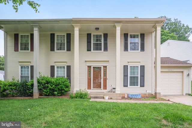 5941 Powells Landing Rd, Burke, VA 22015 - greek revival inspired property with an attached garage, a front yard, and driveway