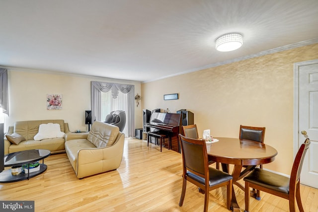 5941 Powells Landing Rd, Burke, VA 22015 - dining space with crown molding and light wood-type flooring