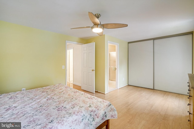 5941 Powells Landing Rd, Burke, VA 22015 - bedroom featuring light wood finished floors, a closet, and ceiling fan