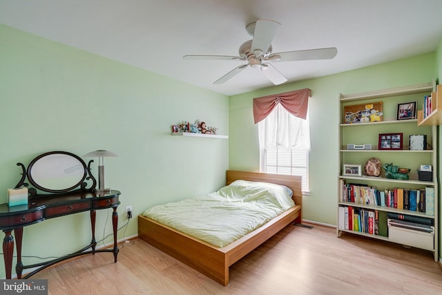 5941 Powells Landing Rd, Burke, VA 22015 - bedroom featuring wood finished floors, baseboards, and a ceiling fan