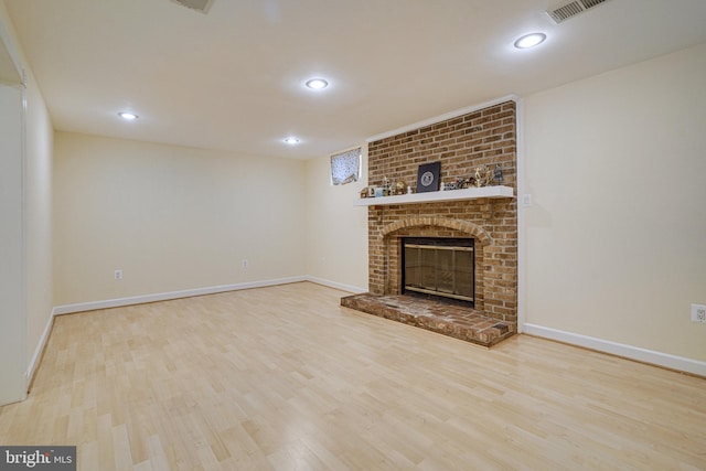 5941 Powells Landing Rd, Burke, VA 22015 - unfurnished living room with a brick fireplace, wood finished floors, recessed lighting, and baseboards