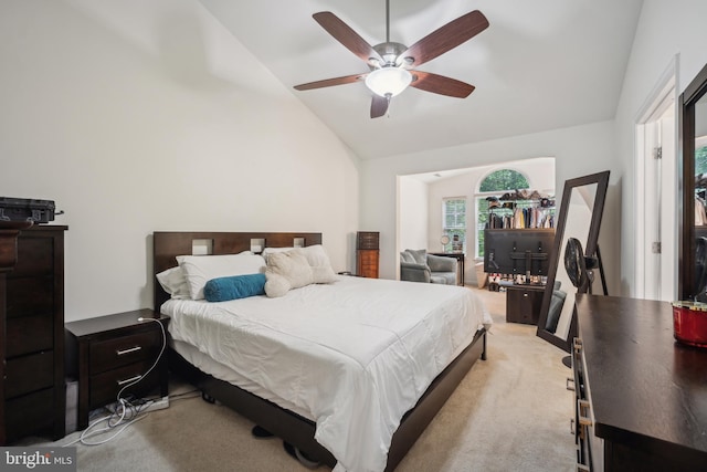 9435 Silver Meteor Ct, Manassas Park, VA 20111 - bedroom with light carpet, high vaulted ceiling, and ceiling fan