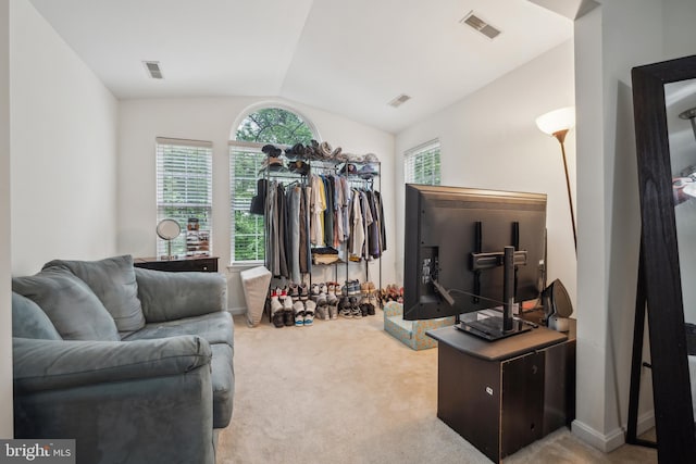 9435 Silver Meteor Ct, Manassas Park, VA 20111 - carpeted living area with lofted ceiling