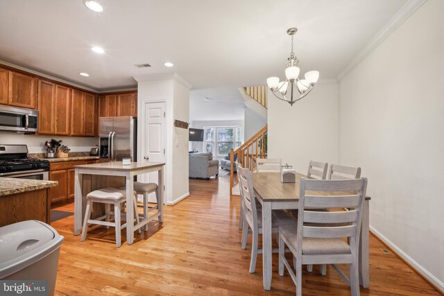 9435 Silver Meteor Ct, Manassas Park, VA 20111 - dining room featuring crown molding, stairs, a chandelier, recessed lighting, and light wood-style flooring