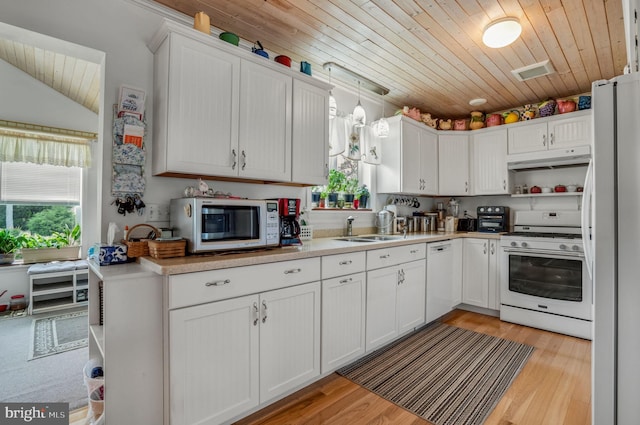 7466 Beebe Rd, Chincoteague Island, VA 23336 - kitchen featuring white appliances, under cabinet range hood, a sink, white cabinets, and wood ceiling