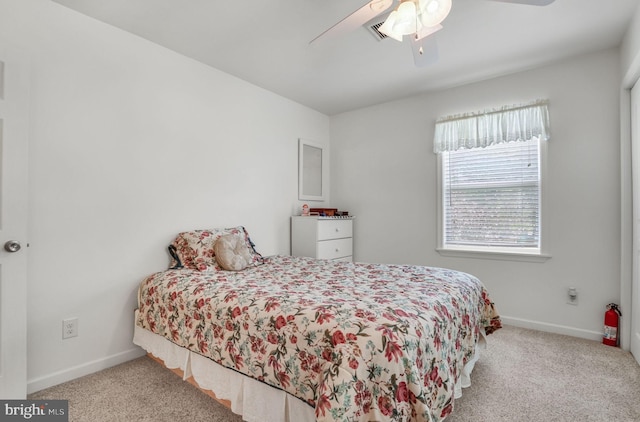 7466 Beebe Rd, Chincoteague Island, VA 23336 - carpeted bedroom featuring baseboards and ceiling fan