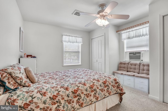 7466 Beebe Rd, Chincoteague Island, VA 23336 - carpeted bedroom featuring cooling unit, ceiling fan, and a closet