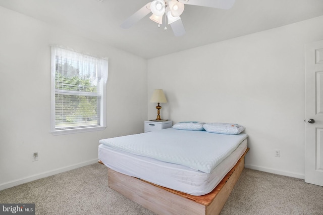 7466 Beebe Rd, Chincoteague Island, VA 23336 - bedroom with carpet floors, baseboards, and ceiling fan