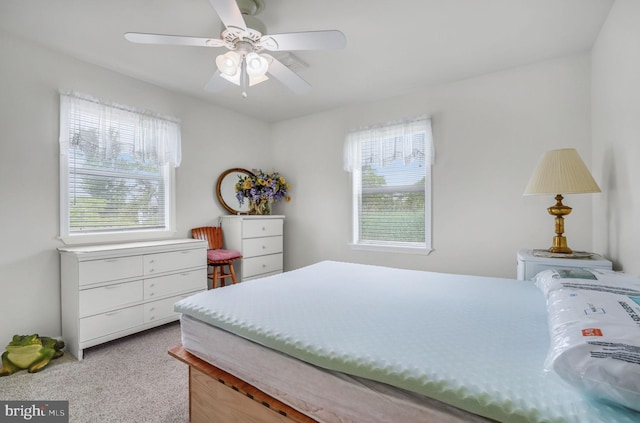 7466 Beebe Rd, Chincoteague Island, VA 23336 - carpeted bedroom featuring ceiling fan