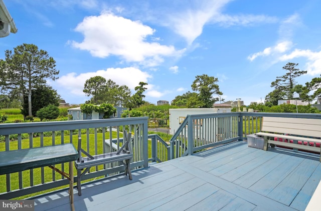 7466 Beebe Rd, Chincoteague Island, VA 23336 - wooden deck featuring a yard