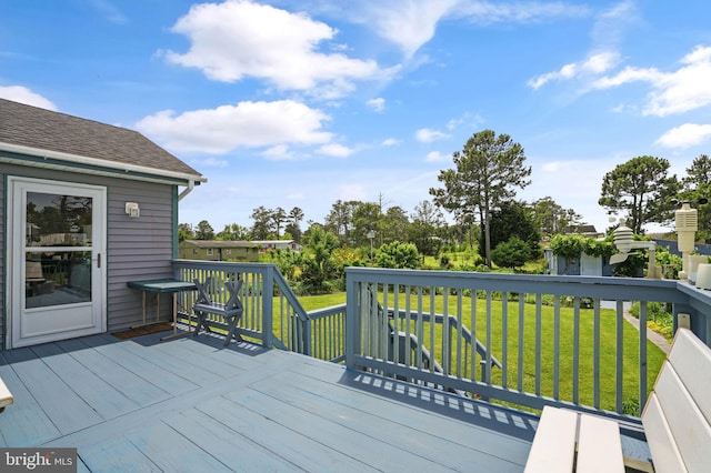7466 Beebe Rd, Chincoteague Island, VA 23336 - wooden deck with a lawn