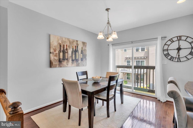1027 Regency Pl, Sewell, NJ 08080 - dining room with a chandelier, wood finished floors, and baseboards