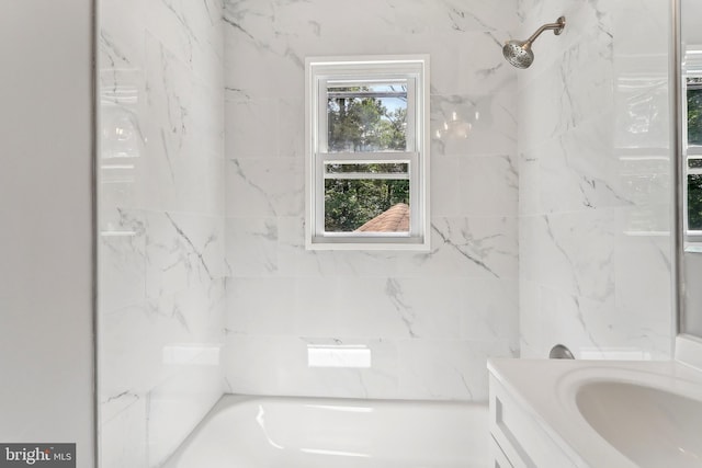 full bathroom with vanity, a shower, and a tub to relax in