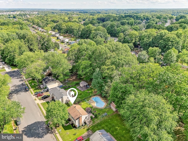 drone / aerial view of a heavily wooded area
