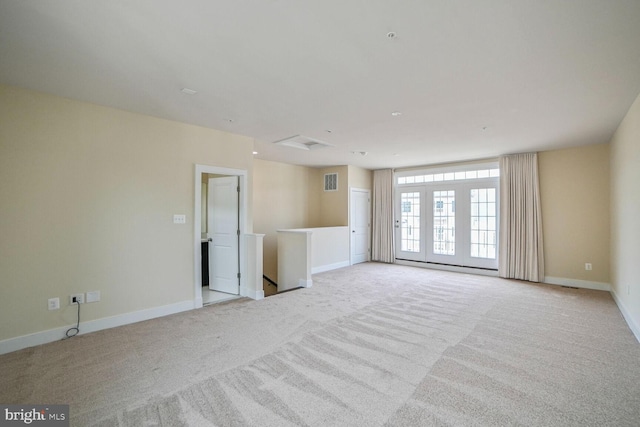 2519 Auden Dr, Silver Spring, MD 20906 - unfurnished room featuring light colored carpet and attic access