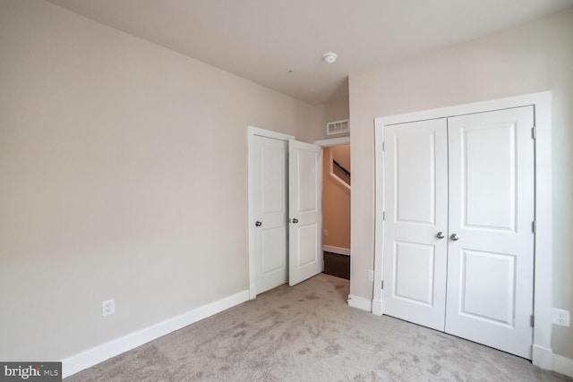2519 Auden Dr, Silver Spring, MD 20906 - unfurnished bedroom featuring light carpet and a closet