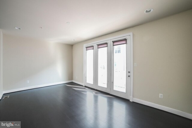 2519 Auden Dr, Silver Spring, MD 20906 - empty room featuring dark wood-style floors and recessed lighting