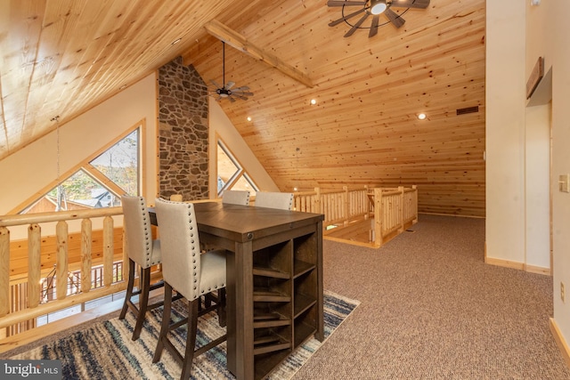 additional living space featuring wooden ceiling, ceiling fan, high vaulted ceiling, baseboards, and carpet