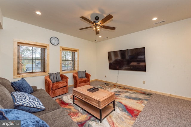 living area with carpet flooring, a ceiling fan, recessed lighting, and baseboards